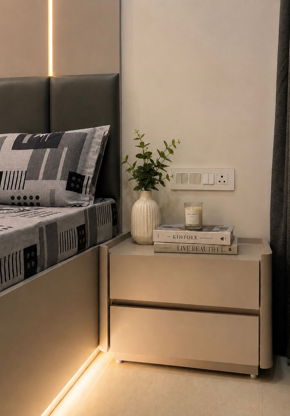 Bedroom shelf nook with charging station at Sipani House